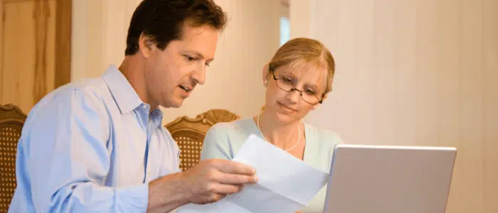 Couple looking at their medical bills